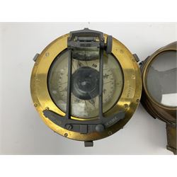 Early 20th century ships brass cased binnacle marked patt.1152 of domed cylindrical form with lift-off top, gimbal mounted compass and enclosed oil lamp in side box, on grey painted base with traces of Hull suppliers label. No.6525W, also numbered 8135E H28cm  