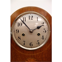  Edwardian arched top inlaid mahogany mantel clock with silvered Arabic dial, twin train movement striking the hours on a gong, H31cm  