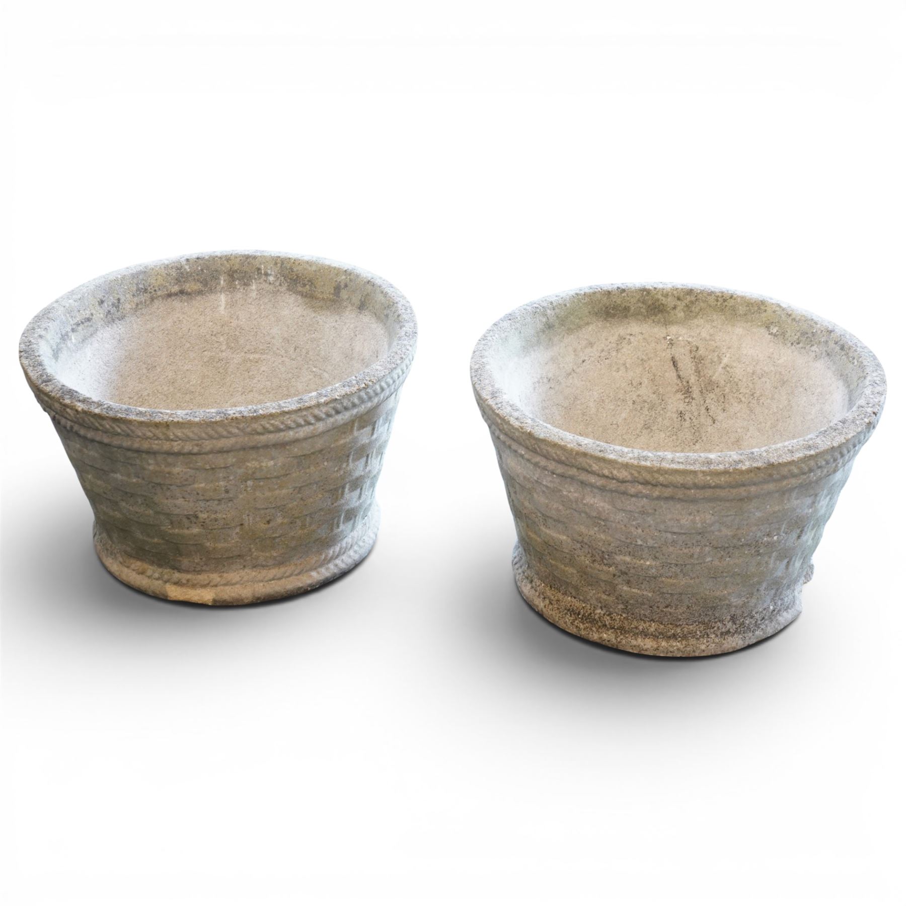 Cast stone basket weave rectangular planter, together with two circular stone planters with basket and rope design 