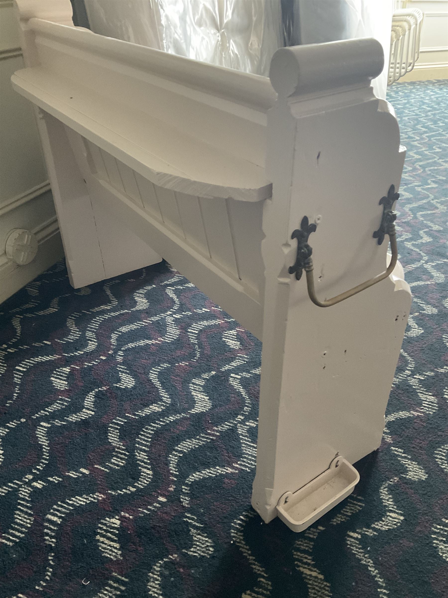 Small painted pew, with umbrella stands- LOT SUBJECT TO VAT ON THE HAMMER PRICE - To be collected by appointment from The Ambassador Hotel, 36-38 Esplanade, Scarborough YO11 2AY. ALL GOODS MUST BE REMOVED BY WEDNESDAY 15TH JUNE.