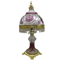  20th century Bohemian crystal table lamp with ruby red overlay, gilt metal mounts and cut glass drops, H58cm   