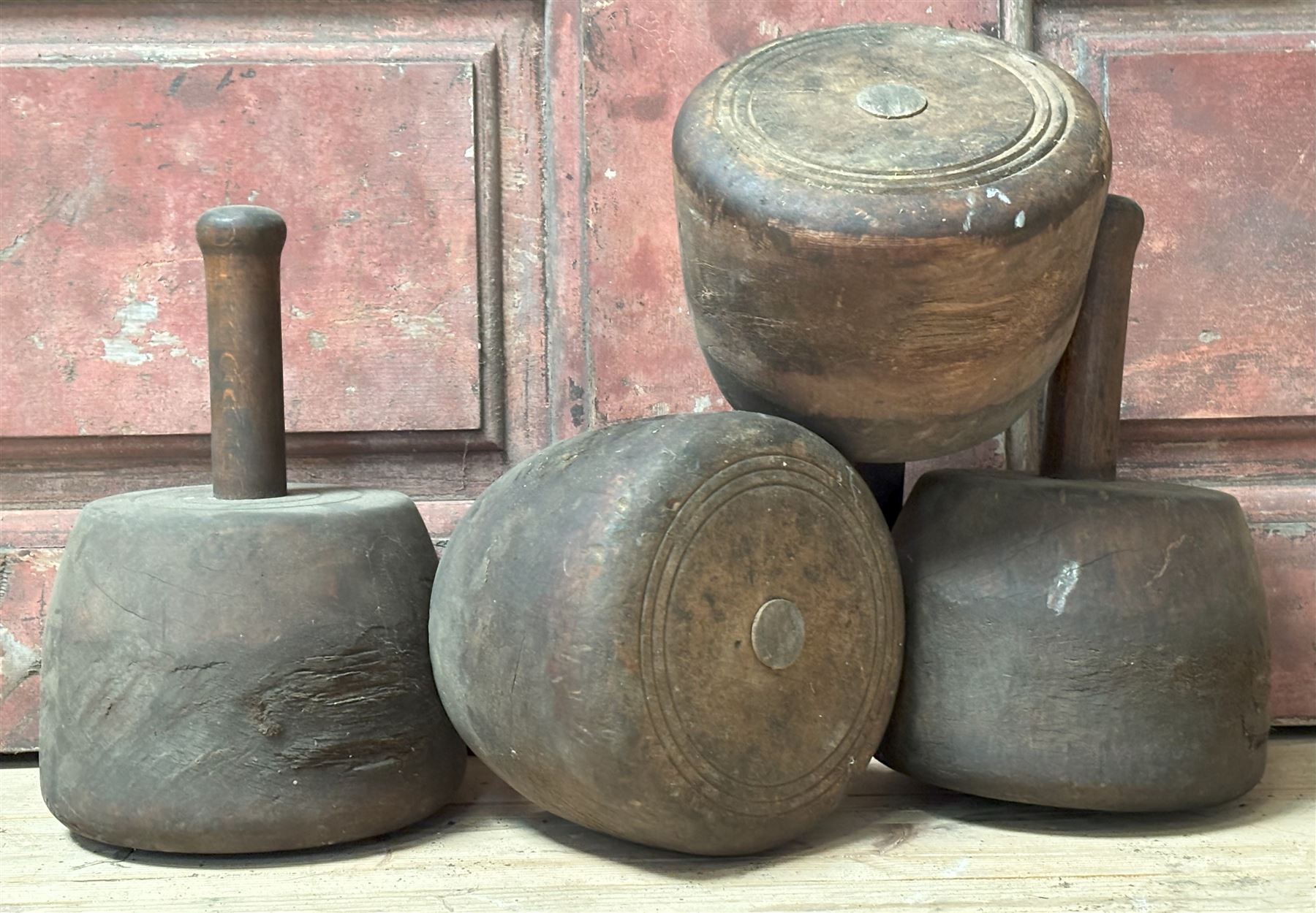 Set of four large turned treen mallets, late 19th century. H25cm - COLLECTION BY APPOINTMENT FROM: The White House, Thirsk Road, Easingwold, York, YO61 3NF - CALL 01723 507111 TO ARRANGE