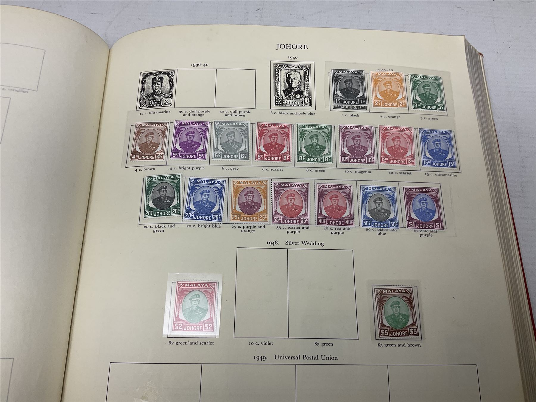 Single album collection of King George VI stamps, including Aden, Antigua, Ascension, Australia, Bahamas, Bahrain, Barbados, Basutoland, Bechuanaland, Bermuda, British Solomon Islands, Brunei, Burma, Cayman Islands, Dominica, Falkland Islands, Gambia, Gilbert and Ellice Islands, Gold Coast, Great Britain 1939-48 set to one pound including ten shilling dark blue, Grenada, Hong Kong, India, Ireland, Jamaica, Leeward Islands, Malta, Mauritius, New Zealand etc