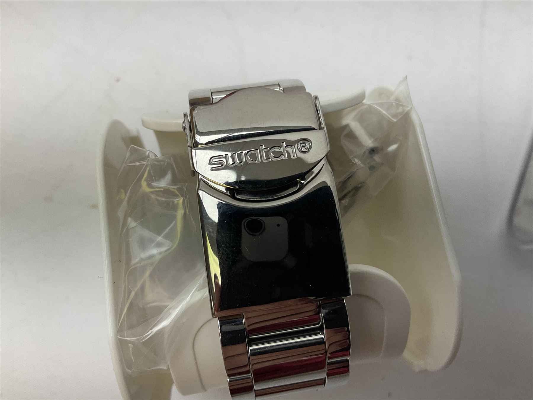 Swatch Irony chronograph stainless steel quartz wristwatch, on original tan leather strap and one other Irony quartz wristwatch, on stainless steel strap both boxed (2)