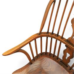 Pair of high back Windsor armchairs, fleur de lis back splat, dished seat, caroline stretcher