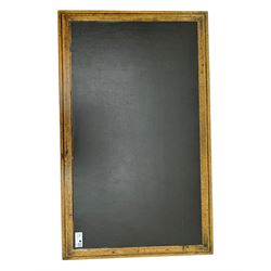 Victorian pine writing table, rectangular top with moulded edge and inset leather writing surface, the frieze fitted with two short drawers, raised by turned supports 