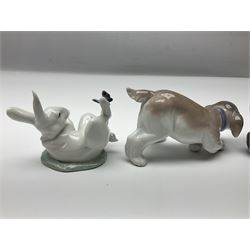 Five Lladro figures, comprising Cat and Mouse no. 5236, That Tickles no. 5888, Gentle Surprise no. 6210, Little Hunter no. 6212 and Resting Polar Bear no. 1208, largest H12cm