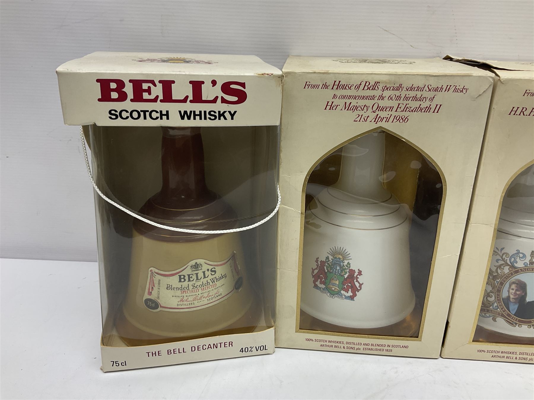 Bells, Scotch whisky, in eight Wade ceramic decanters, including Christmas 1992, Queens 60th birthday, Birth of Prince William etc, various contents and proof   