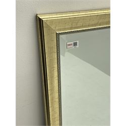 Gilt framed bevelled edge wall mirror