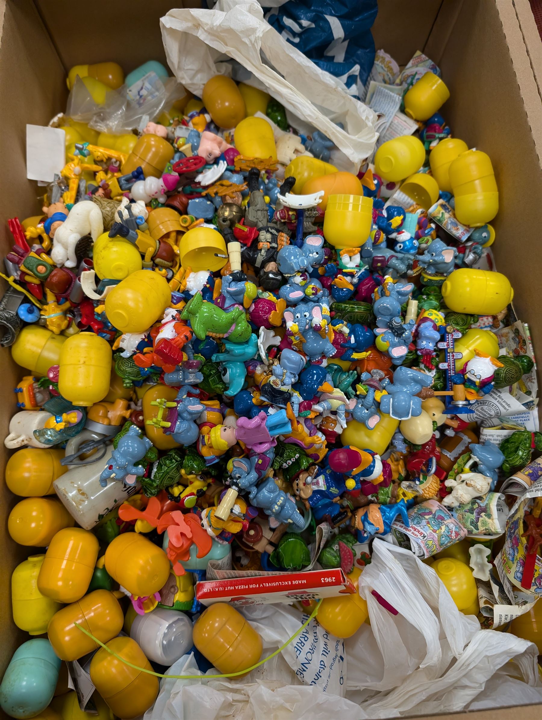 Large collection of Kinder Egg toys, together with other figures and collectables