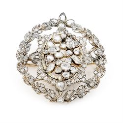 19th century floral spray diamond brooch, three central flower heads set with rose cut and...