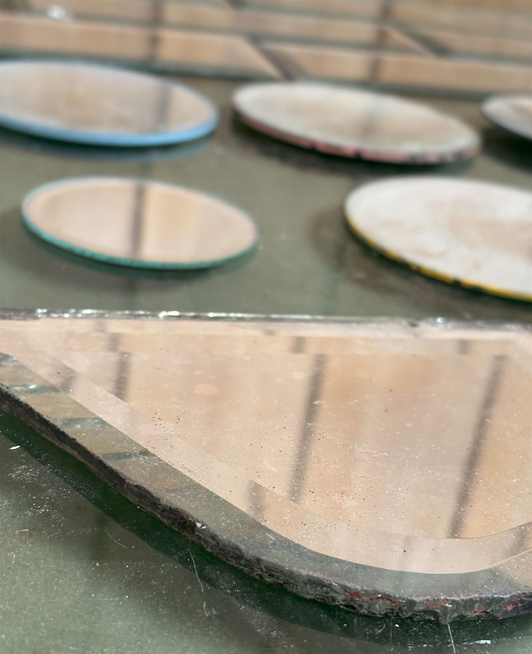 Group of early 20th century mirror panels, eight bevelled and of rectangular outline (23cm x 8cm) five circular concave, etc.  - COLLECTION BY APPOINTMENT FROM: The White House, Thirsk Road, Easingwold, York, YO61 3NF - CALL 01723 507111 TO ARRANGE