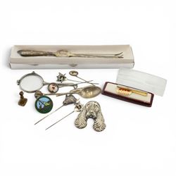 Silver comprising spaniel brooch, Labrador spoon, ceramic dog pin and two horse pins, toge...