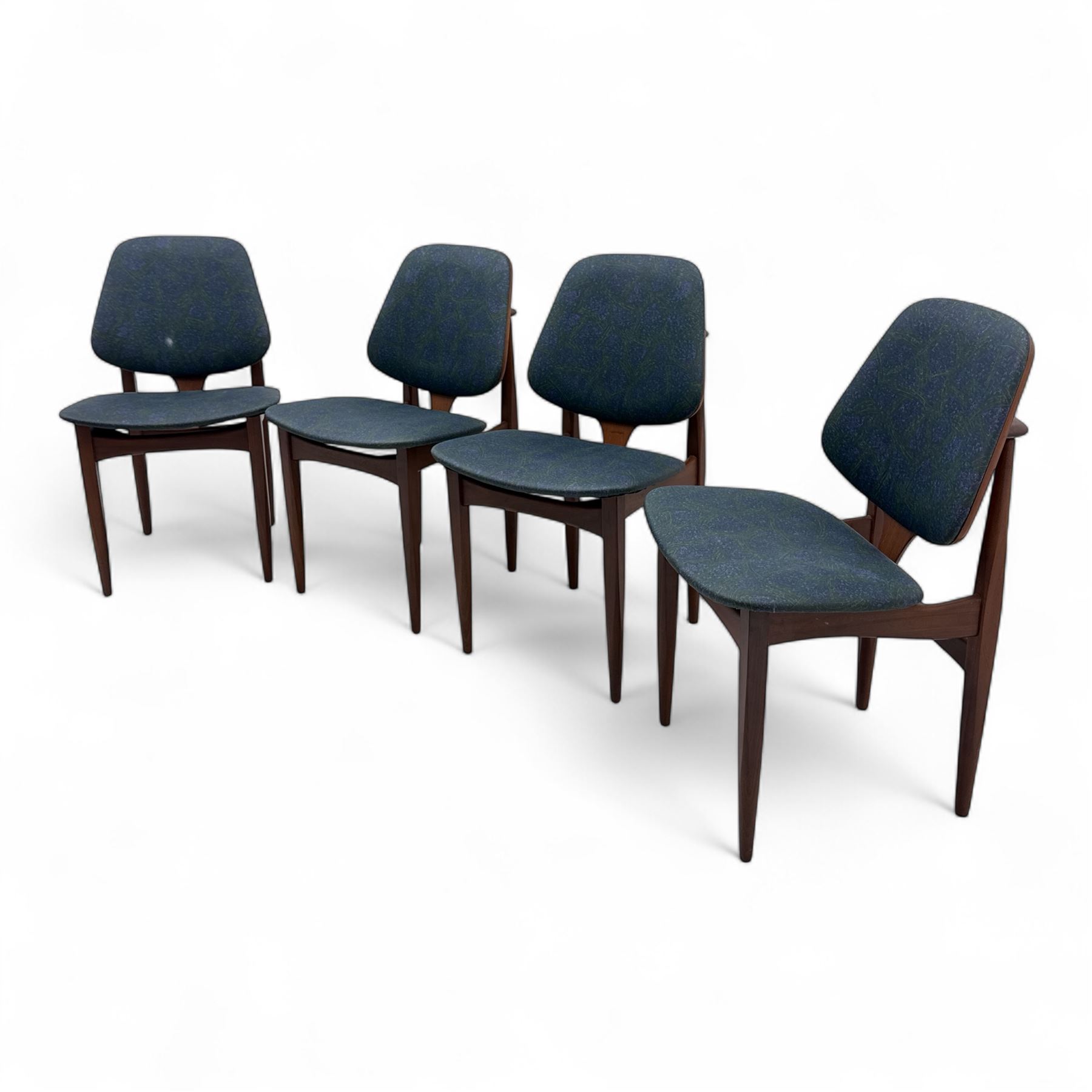 G-Plan - mid-20th century teak oval dining table, with butterfly leaf extension mechanism and four Elliot's of Newbury teak framed dining chairs upholstered in purple and green fabric, table un-extended width 152cm x depth 152cm x height 71cm, chairs 47x37x78cm 