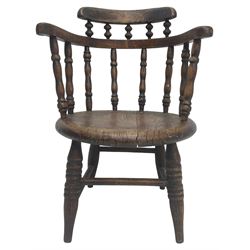 19th century child's spindle back armchair, curved cresting rail over bow arms on spindle supports, circular seat on ring turned supports united by turned stretchers 