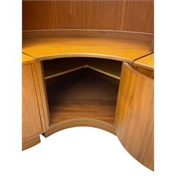 G-Plan - teak three sectional wall unit, fitted with display cabinet enclosed by two sliding glass doors, shelves and cupboards