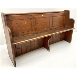 Early 20th century pine panelled back church pew, shaped solid end supports 
