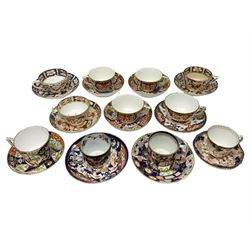 Early 19th century and later, eleven Royal Crown derby teacups and saucers in various patterns, to include Imari, Garden platter, and others, all with printed or painted marks beneath