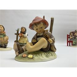 Twenty five Hummel figures by Goebel, to include Little Landscaper, Playmates, Sweet Music, Looking Around etc