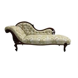 Victorian mahogany chaise longue, scrolled back with pierced and floral carved decoration, champagne foliate pattern fabric, cabriole feet with brass and ceramic castors