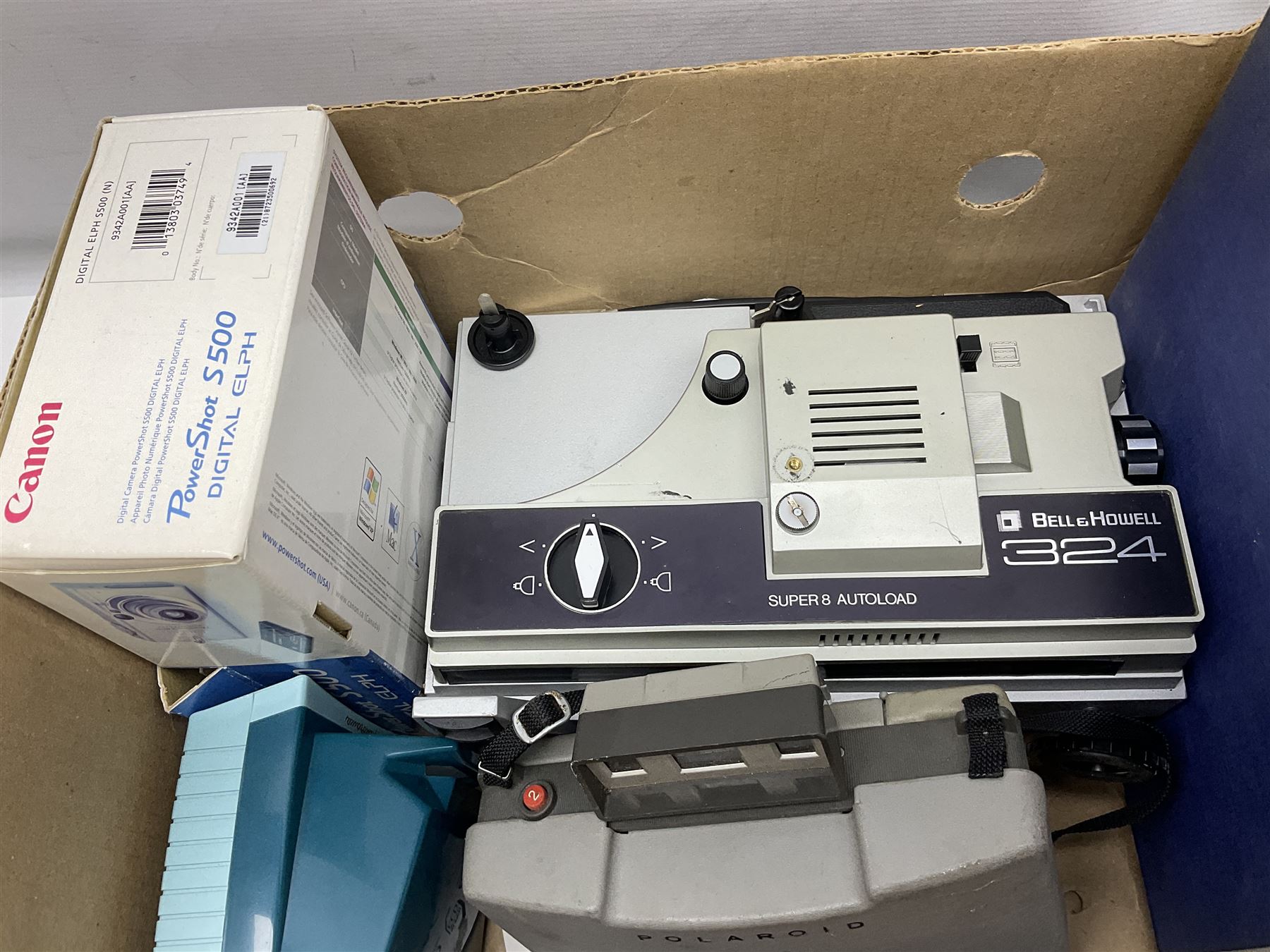 Collection of camera and equipment, to include Canon PowerShot S500, Cosmic 35, polaroid 320, etc, in two boxes  