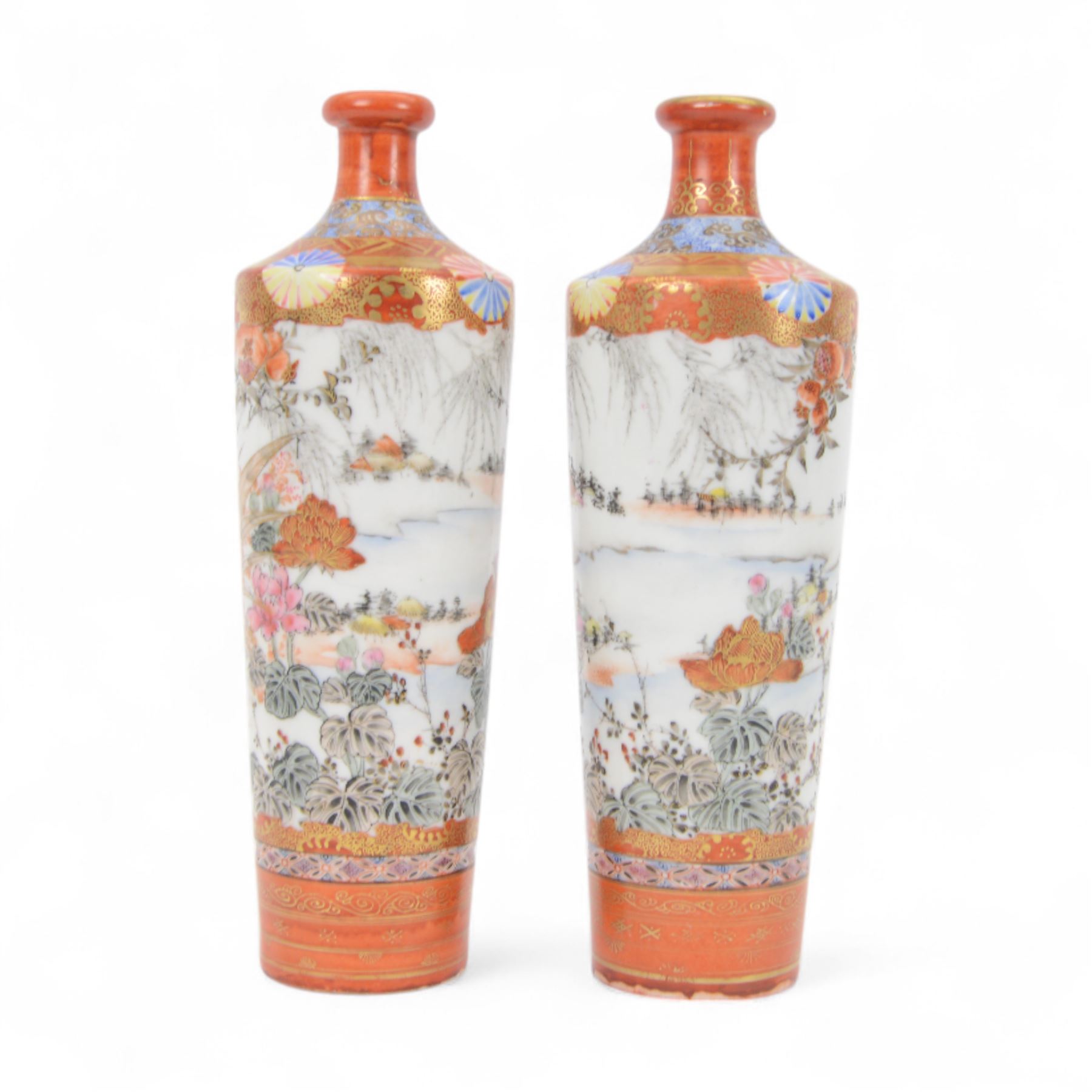 Pair of Japanese Meiji period Kutani vases of slender tapering form, decorated with a bird amongst flowers and trees, each with character marks beneath, H22cm 