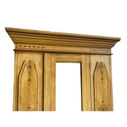 19th century painted pine wardrobe, the projecting cornice over mirror glazed door, with painted decoration depicting scrolling foliate and urns, drawer to base on skirt