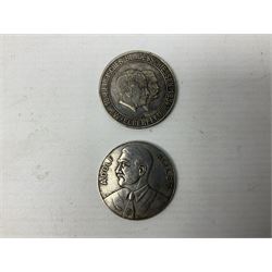 Four post-WW2 'silver' medallions of Adolf Hitler/German interest, two depicting Von Hindenburg also; and pair of 1960s trench art shell case bases as ashtrays mounted with Libyan Five Milliemes coins as cigarette rests (6)