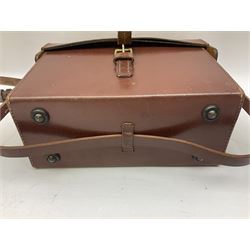 Post-WW2 stitched leather carrying case for an Exploder Dynamo-Condenser Mk.1 with baize lined fitted interior and carrying strap dated 1956 L28cm