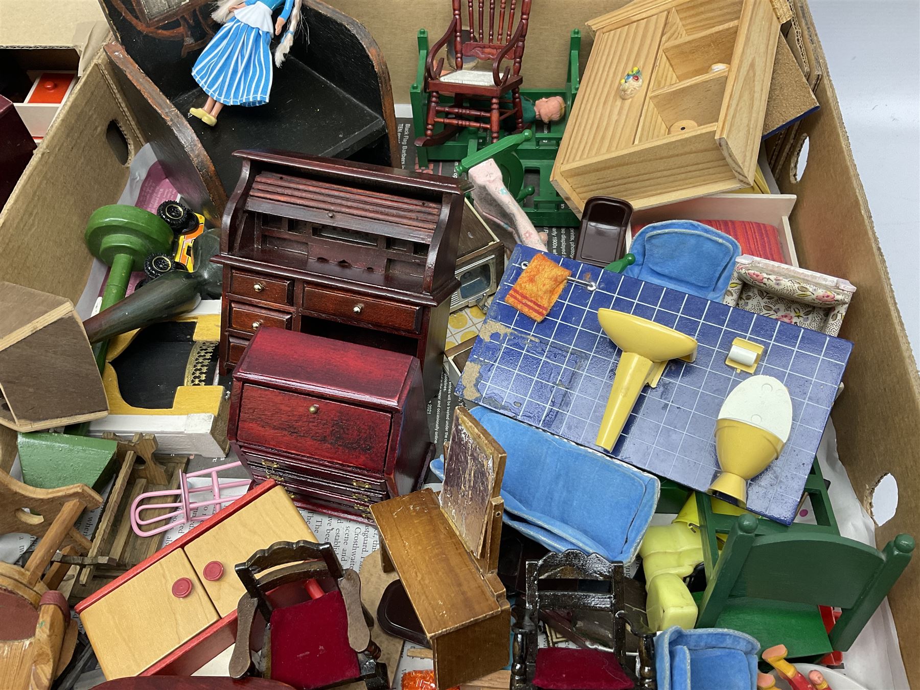 Large quantity of 1970s doll's house furniture, predominantly stained or painted wooden, including lounge, dining room, kitchen and bedroom pieces, bathroom fittings, bureaux and desks, piano, lamps, fire-surrounds etc; various scales