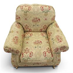 Parker Knoll - 'Henley' floral fabric living room suite, comprising a two seat sofa and pair of armchairs, raised on dark stained turned feet raised on brass castors

Armchairs (H 99cm, W 95cm, D 100cm)