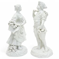 Pair of 19th century Berlin blanc de chine figures of flower sellers on circular bases H25cm and a figure group of mother and child (3)