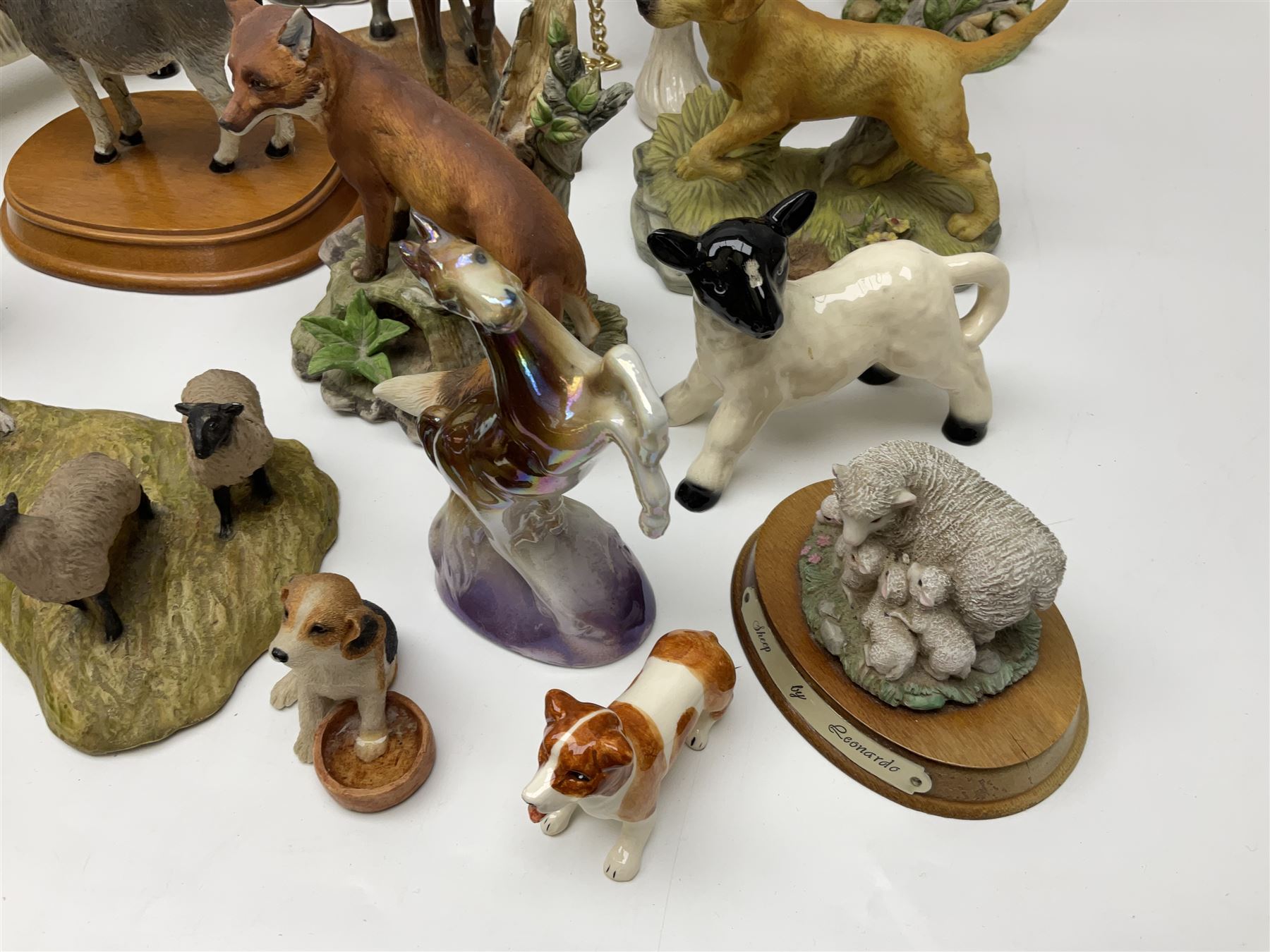 Beswick pigeon no 1383 and a collection of other ceramic animal figures including Campsie Ware lustre budgies, Kowa red fox and Labrador, two shire ponies, two sheep, etc 