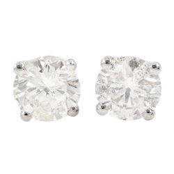 Pair of 18ct white gold round brilliant cut diamond stud earrings, stamped 750, total diamond weight approx 1.20 carat