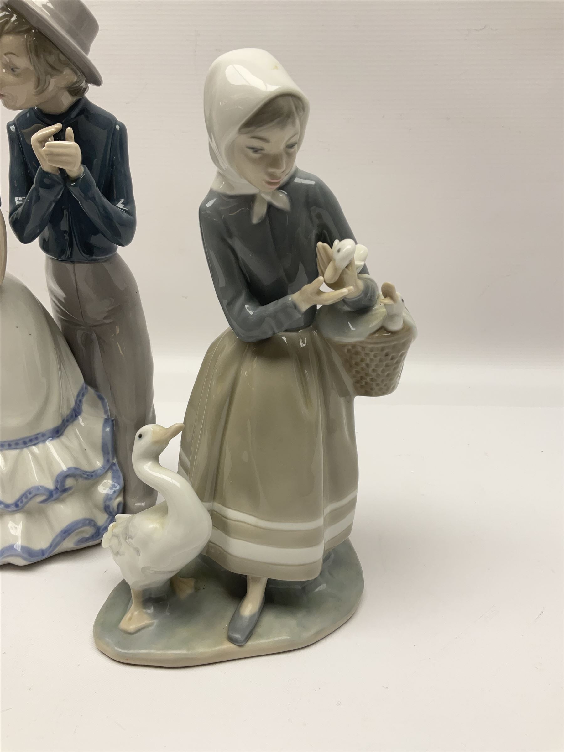 Five Lladro figures, to include How do you do 1439, Sweet Scent 5221, Shepherdess with duck 4568, etc and one Nao 