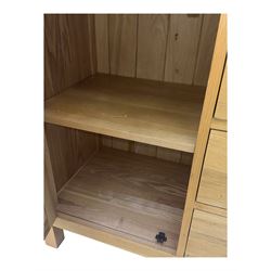 Oak kitchen dresser, raised two-tier back over three drawers and double cupboard