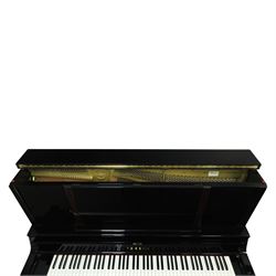 Yamaha model U5 upright piano retailed by Harrods, 88 keys and three pedals within high gloss ebonised case, serial no. 6055292, with Roland black button top piano stool