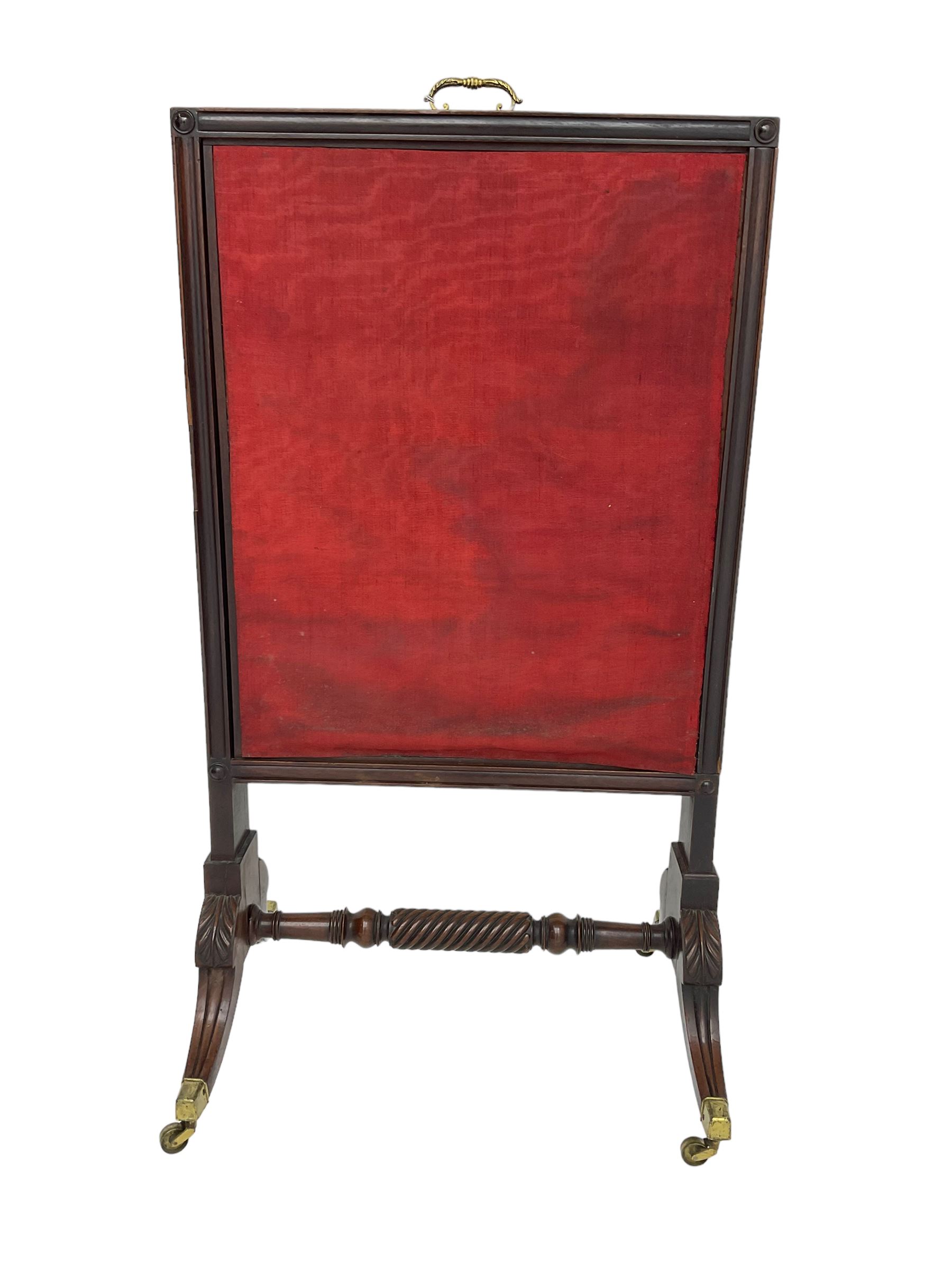 Regency mahogany screen with two horizontal and one vertical pull-out panels, on base with carved sabre legs and rope-twist stretcher