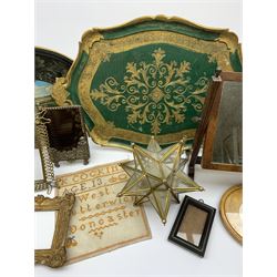 A group of assorted collectables, comprising a small 19th century mahogany swing toilet mirror, H34cm, small Vintage sunburst mirror, various picture frames, small Moravian star glass shade, Vintage toleware tray marked beneath made in Italy, tin tea tray detailed Chatsworth, small cross stitch sampler detailed West Butterwick Doncaster. 