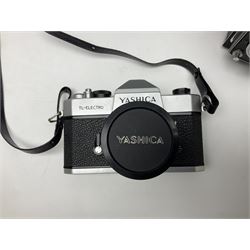 Yashica-A camera body, serial no. A4080073, with 'Yashikor 1:3.5 f=80mm' lens, serial no. 209272 and 'Yashikor 1:3.5f=80mm' lens, serial no 22942, together with Yashica TL-Electro camera body, serial no. 5054162 with 'Yashinon-DS 50mm 1:1.9  40056038