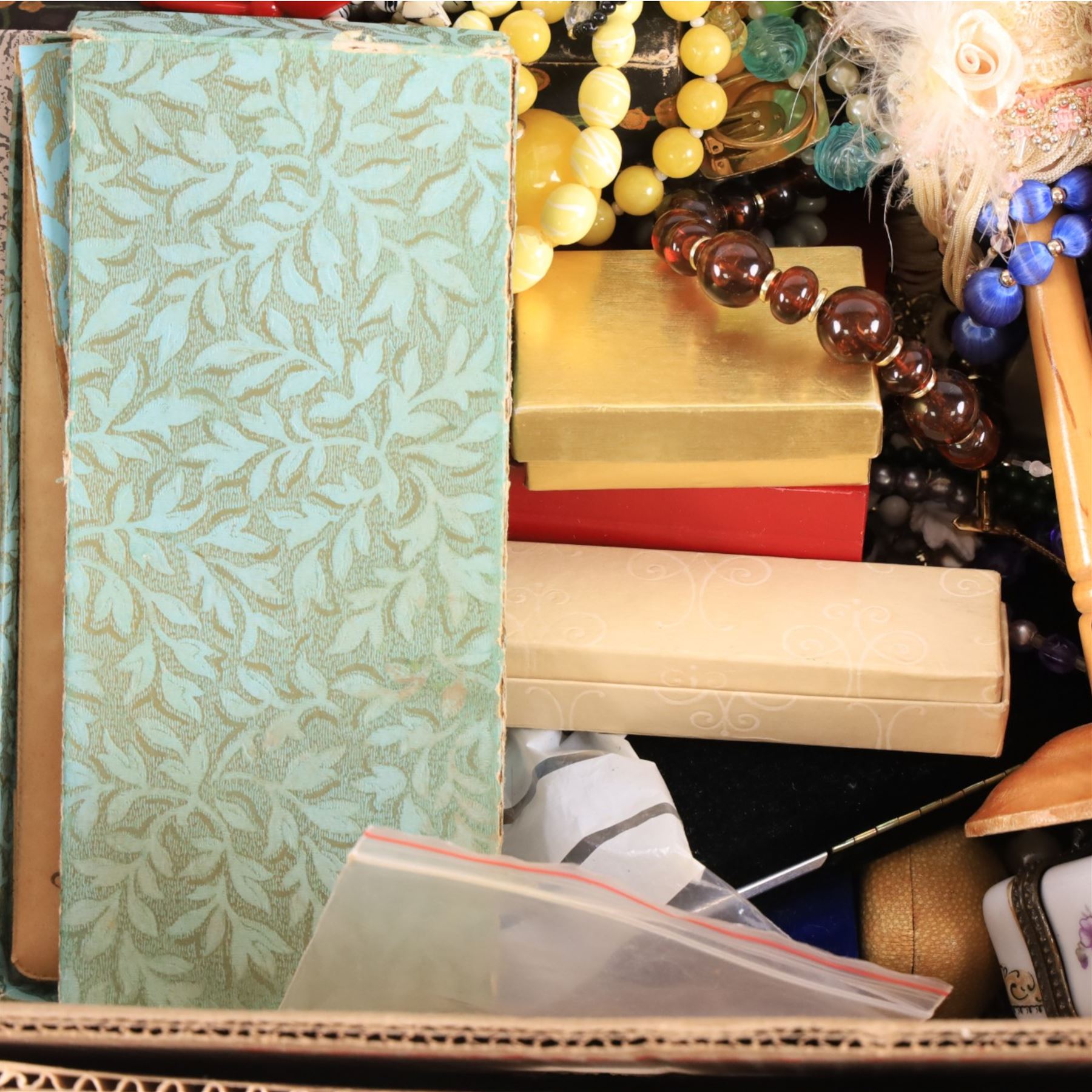 Large collection of costume jewellery, including beaded necklaces, brooches, rings, necklaces etc and compact mirrors