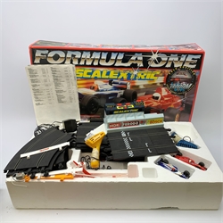 Scalextric - Formula One set and Mighty Metro set, both boxed; two boxes of extra track; and box of Race Tuning Accessories