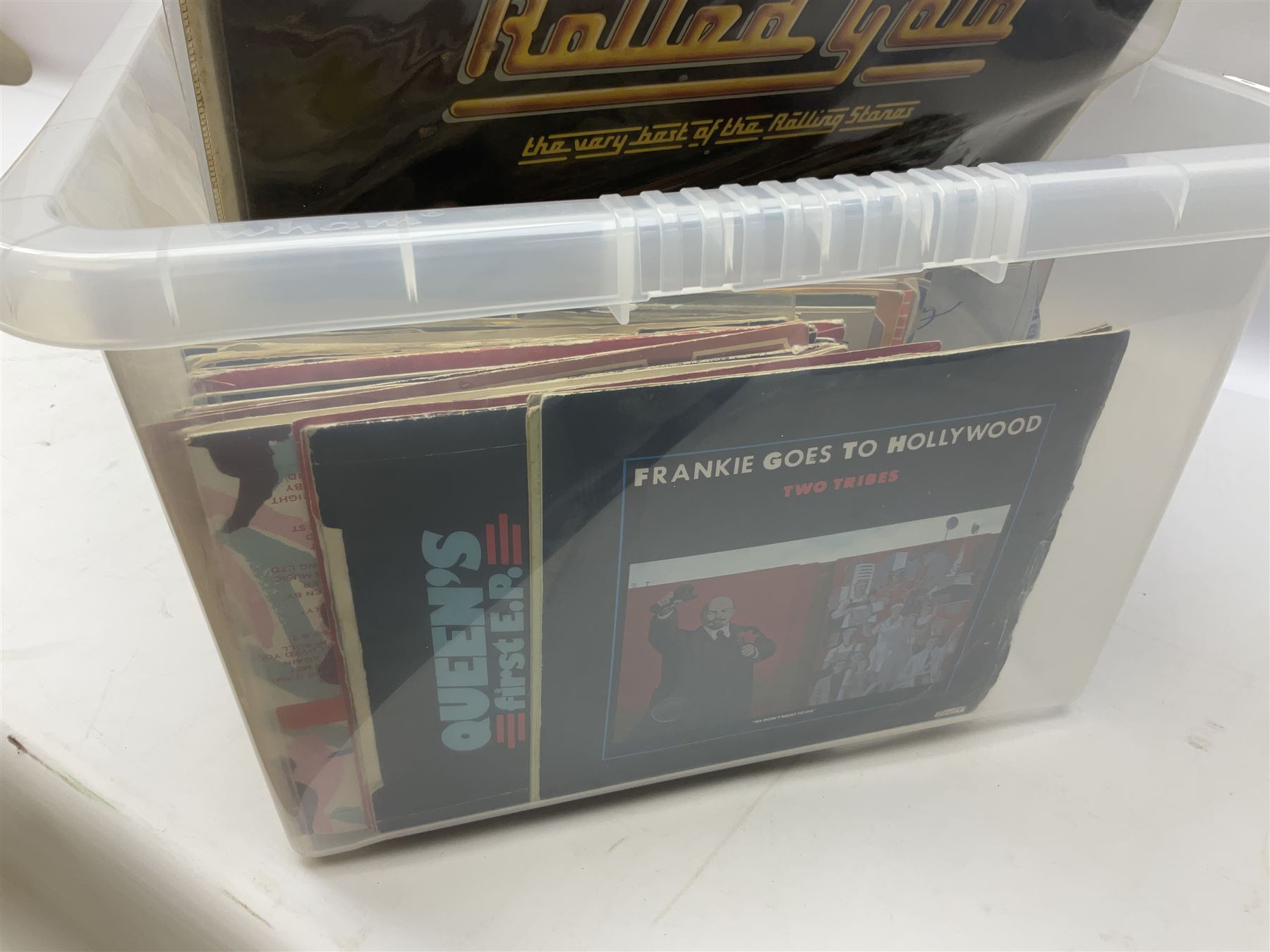 Large quantity of vinyl LPs, predominantly rock and pop, to include Elvis, Elton John, The Kinks, Deep Purple, Eurythmics, Whitney Houston, Phil Collins, Rolling Stones etc, in three boxes, together with quantity of 45 rpm records, Steepletone SRP1R-11 record player and record carry case