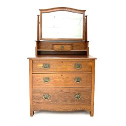 Arts & Crafts period oak dressing chest, raised mirror back with single trinket drawer above three graduating drawers, stile supports