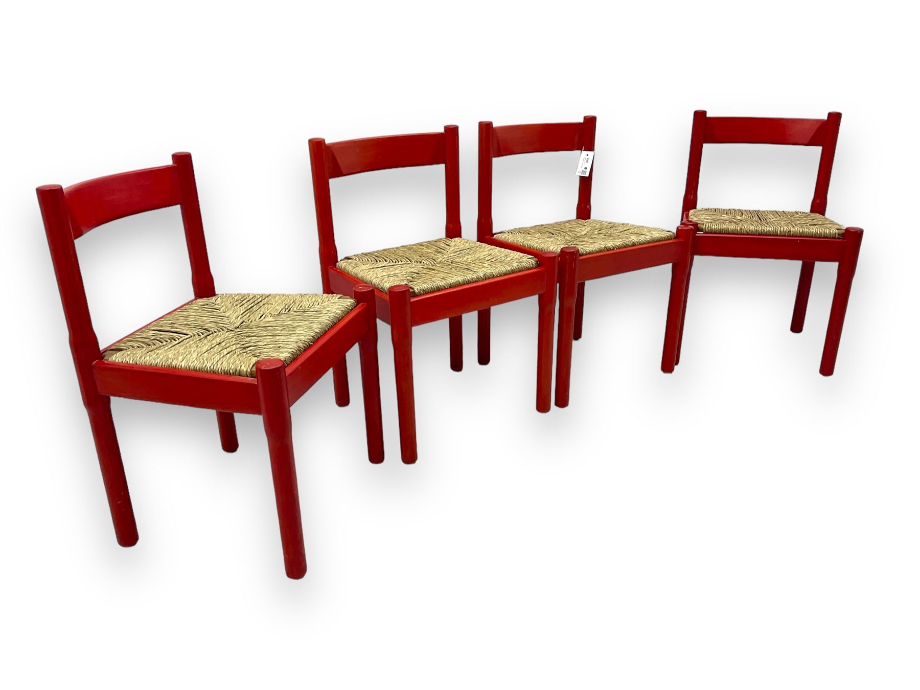 Vico Magistretti - mid-20th century circa. 1970s set of four beech framed dining chairs in red finish, with drop-in rush seats