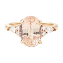 14ct rose gold pink / peach sapphire and diamond ring, single oval cut sapphire of 3.07 ca...