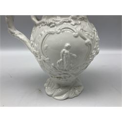 Pair of early/mid 19th century Copeland and Garrett white glazed pitchers, modelled in the Georgian style and moulded with the figures of Venus the Roman Goddess of Love, and Aurora the Roman Goddess of Dawn, within C scroll borders and foliate surround, the naturalistically modelled handle leading to a fruiting vine beneath the rim, upon a spreading base moulded with seashells, with printed green crowned wreath mark beneath, H20cm