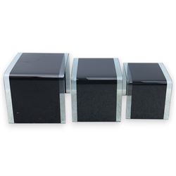 Nest of three contemporary glass occasional tables, black glass centres with  clear glass borders 