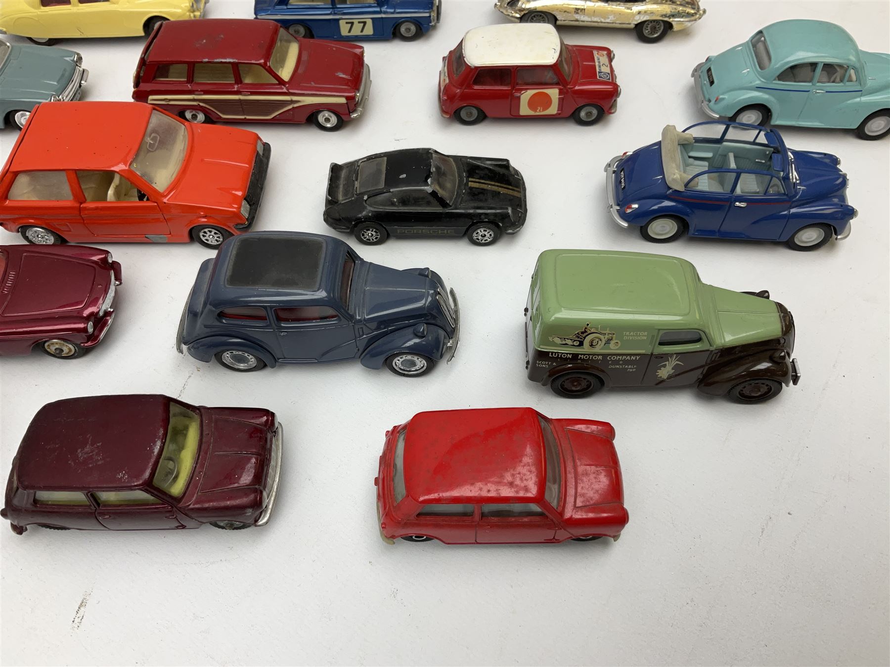 Corgi - thirty unboxed and playworn/repainted die-cast cars including Triumph Herald Coupe, BMC Mini-Cooper 'S', Porsche Carrera, two 'E' Type Jaguars, Rover 2000TC, three Morris Minors, two Aston Martin DB4, two Volvo P1800, MGA, Fiat 2100, Jaguar 2.4 Litre, Jaguar Mark X Saloon etc (30)
