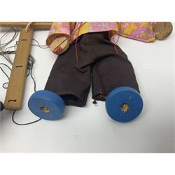 Pelham Puppet - three puppets comprising a painted wooden duck with felt mouth and wings with metal joints H12cm, in original box and instructions; and two further examples Type A cat with a hollow body H12cm, and a boy H23cm (3) 